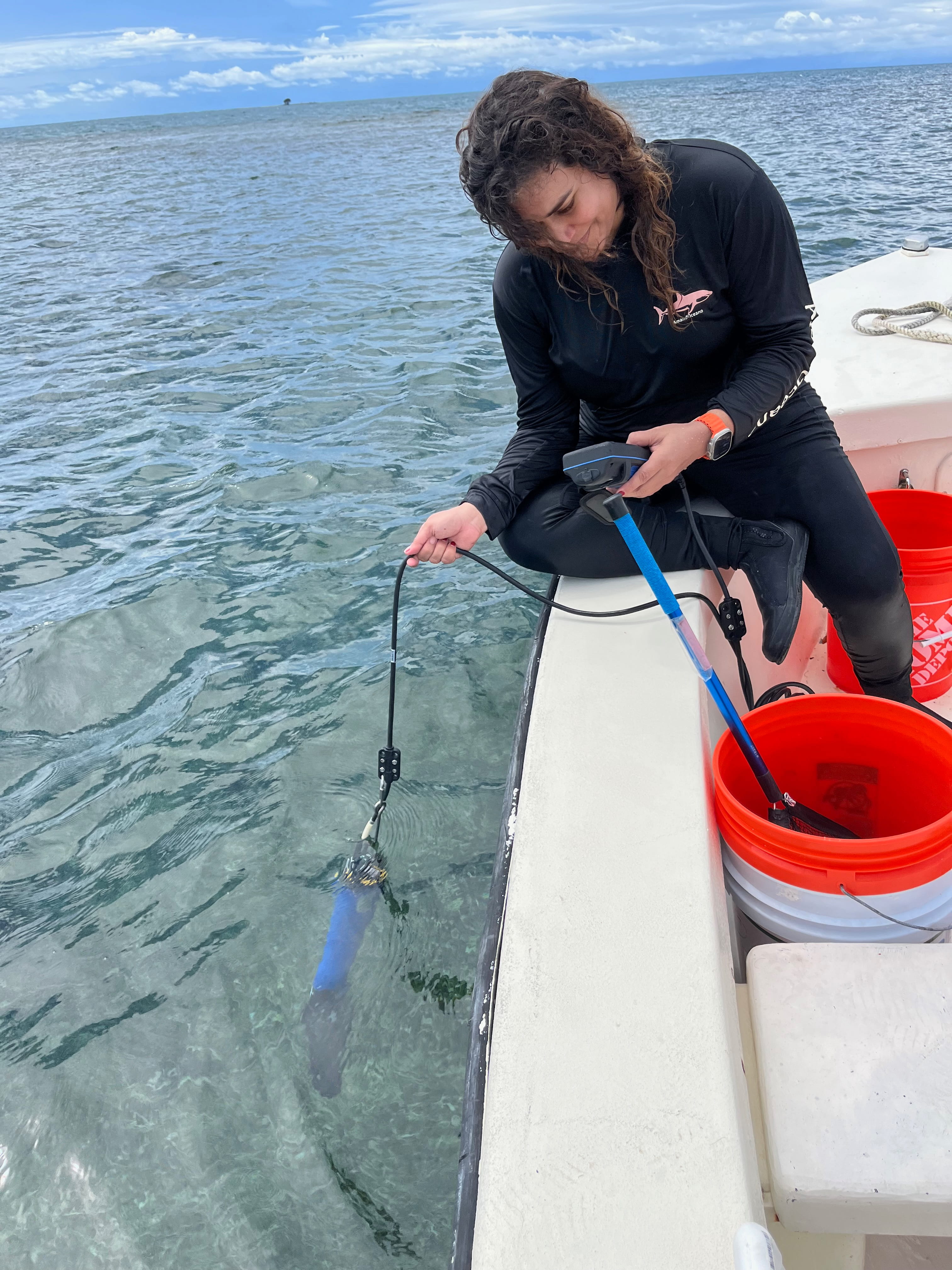 Jenniffer Perez, PhD candidate monitoring water parameters at our coral reef sites.